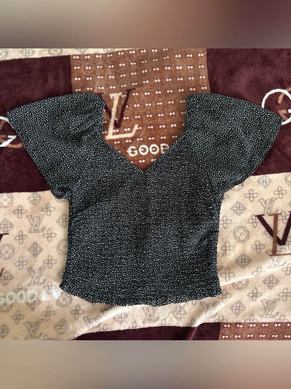 Polka dot mesh sleeve smocked top